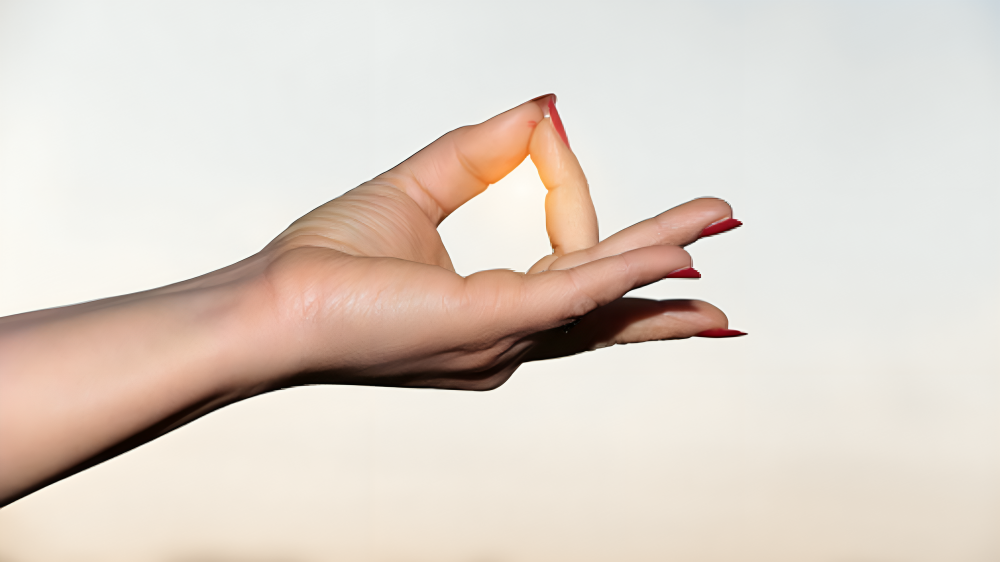 Shuni Mudra, also known as the "Seal of Patience," is one of the many mudras (hand gestures) used in yoga and meditation practices. It's believed to help cultivate patience, discipline, and focus, connecting you to the energies of the universe.