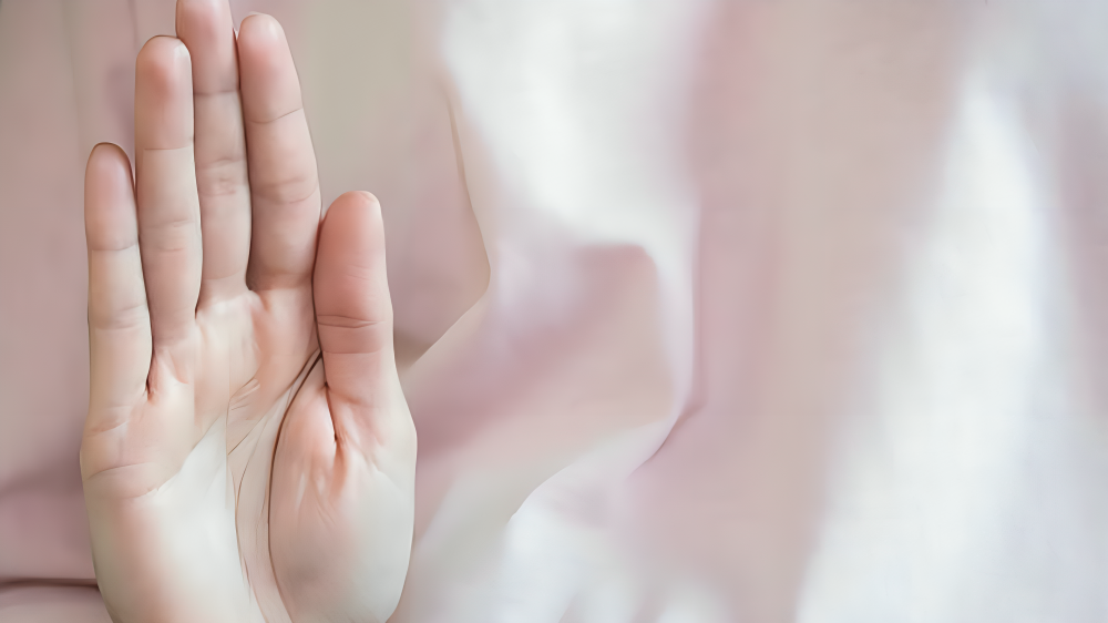 specifically the Abhaya Mudra. This ancient hand gesture has been used for centuries to evoke a sense of fearlessness and protection.